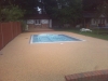 Bonded aggregate paving around pool