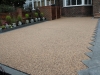 Bonded aggregate paving and stone pathway